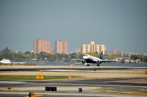 A US Airways jet landing at LaGuardia