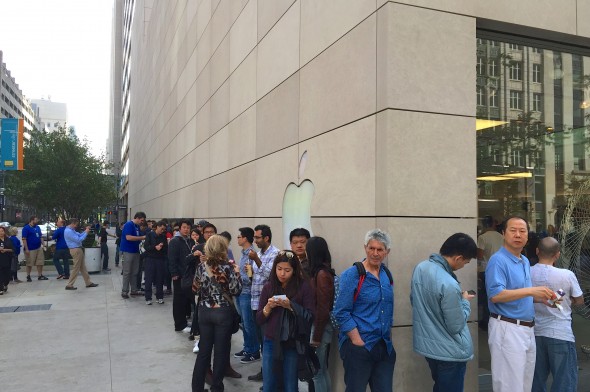 Customers lined up at an Apple store in Chicago on Saturday